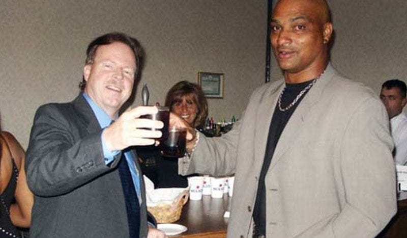 Ted Hanes giving award to Darryl Talley