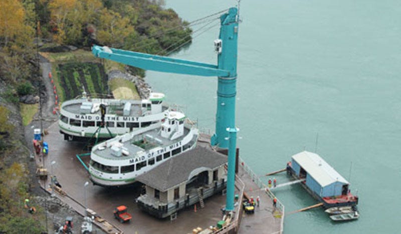 Two Maid of The Mist boats on a crane