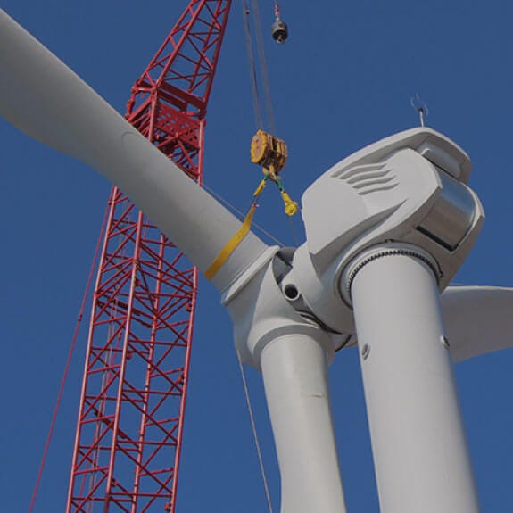 Wind Turbine with a Crane in Front of it crane in front of wind turbine
